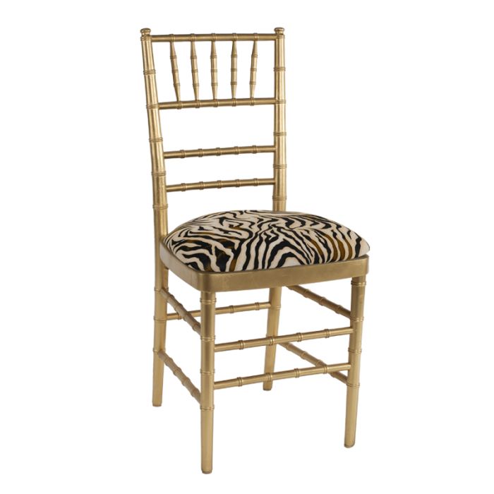 Rent the Gold Chiavari Chair with Zebra Stretch Knit CORT Party Rental